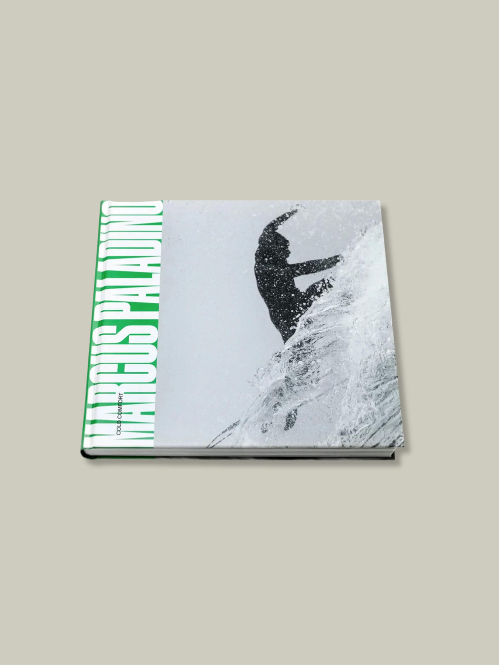 Front cover of surf photography book named Cold Comfort by Marcus Paladino