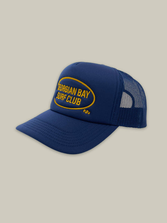 Angled front profile of the Blue GBSC Ricos Trucker hat